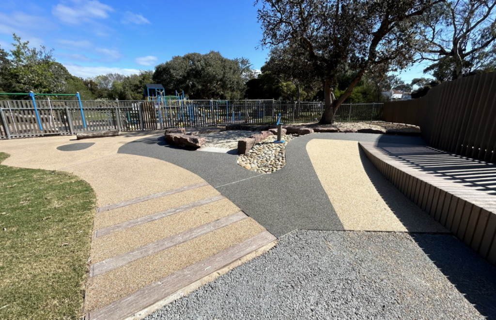 Custom edging installed for a child friendly pathway