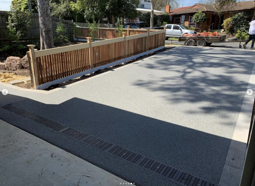 photo if permeable paving in Silver ash and bluestone, a perfect pairing for a light driveway